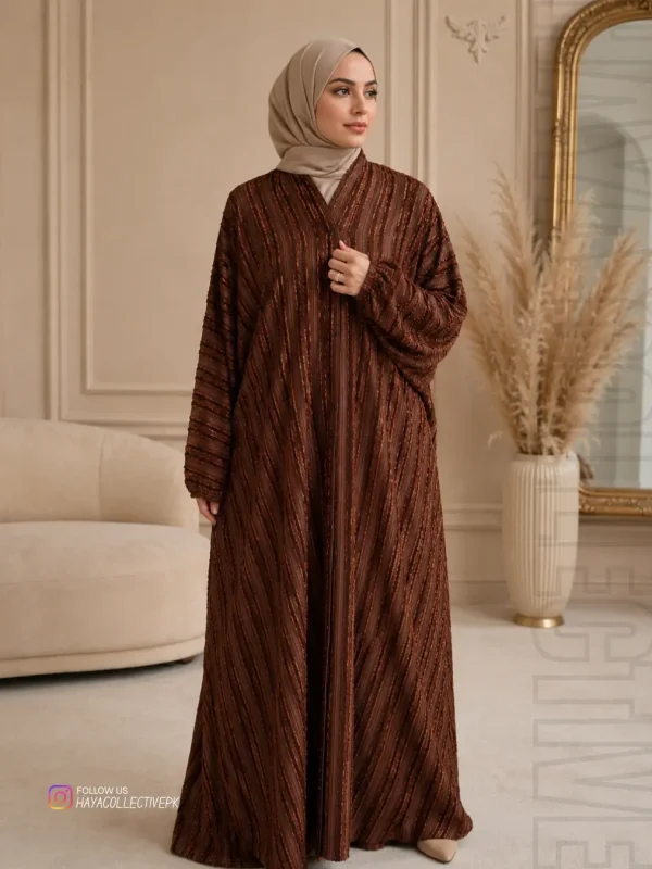 Full-length premium brown Broshia abaya featuring elegant textured fabric and modest silhouette