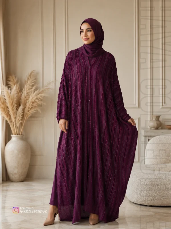 Front view of Luxury Deep Plum Textured Open Front Abaya featuring premium velvet-inspired textured fabric, flowing modest silhouette, and elegant front-open design by Haya Collective.